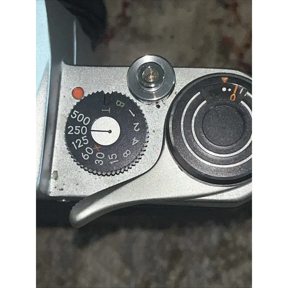 Vintage Honeywell Pentax 35 Mm Camera Features A Classic Silver And Black Finish